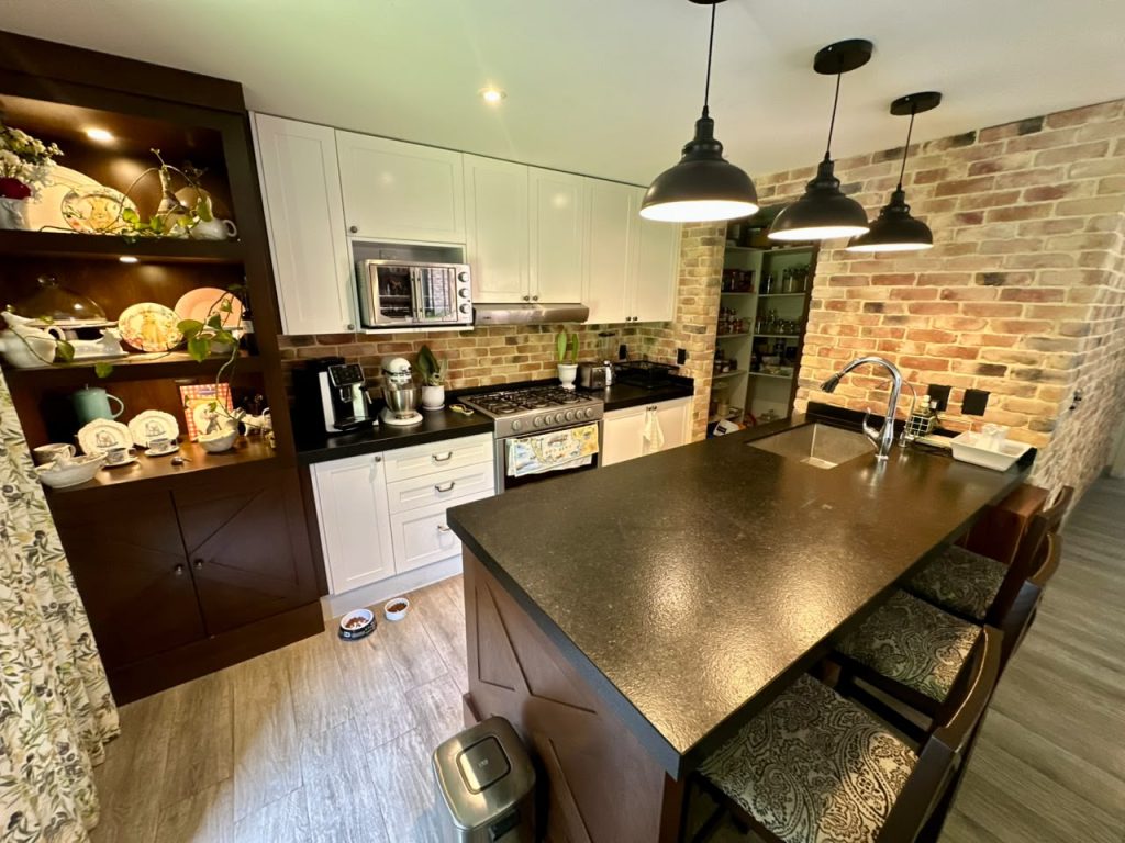 Galería de Las Cañadas La Reserva Casa en Venta con Patio Interno y Jardín Amplio